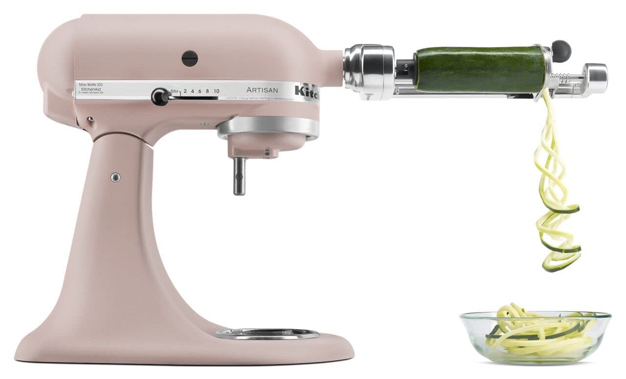 Tilt-head access enables easy ingredient addition on KitchenAid Artisan mixer.