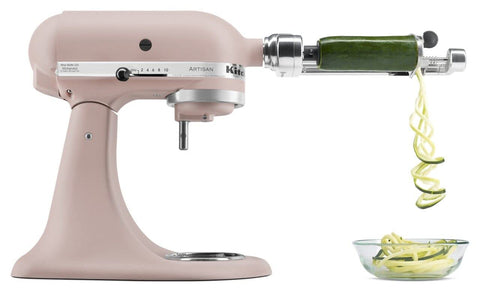 Tilt-head access enables easy ingredient addition on KitchenAid Artisan mixer.