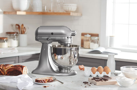 KitchenAid Artisan mixer in contour silver complements modern kitchens.