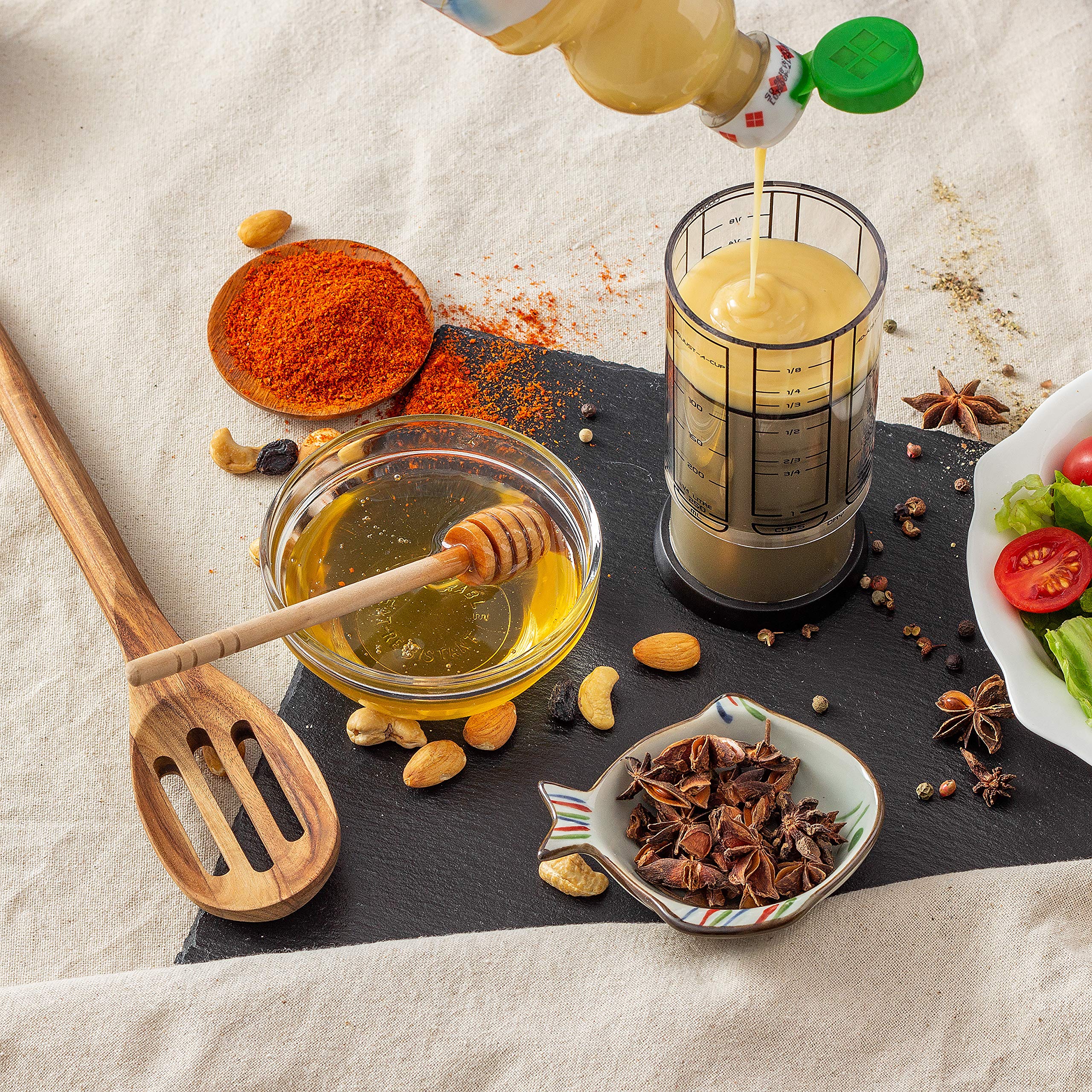 KitchenArt Pro 2-Cup Adjust-A-Cup supports doubling recipes and easy conversions.