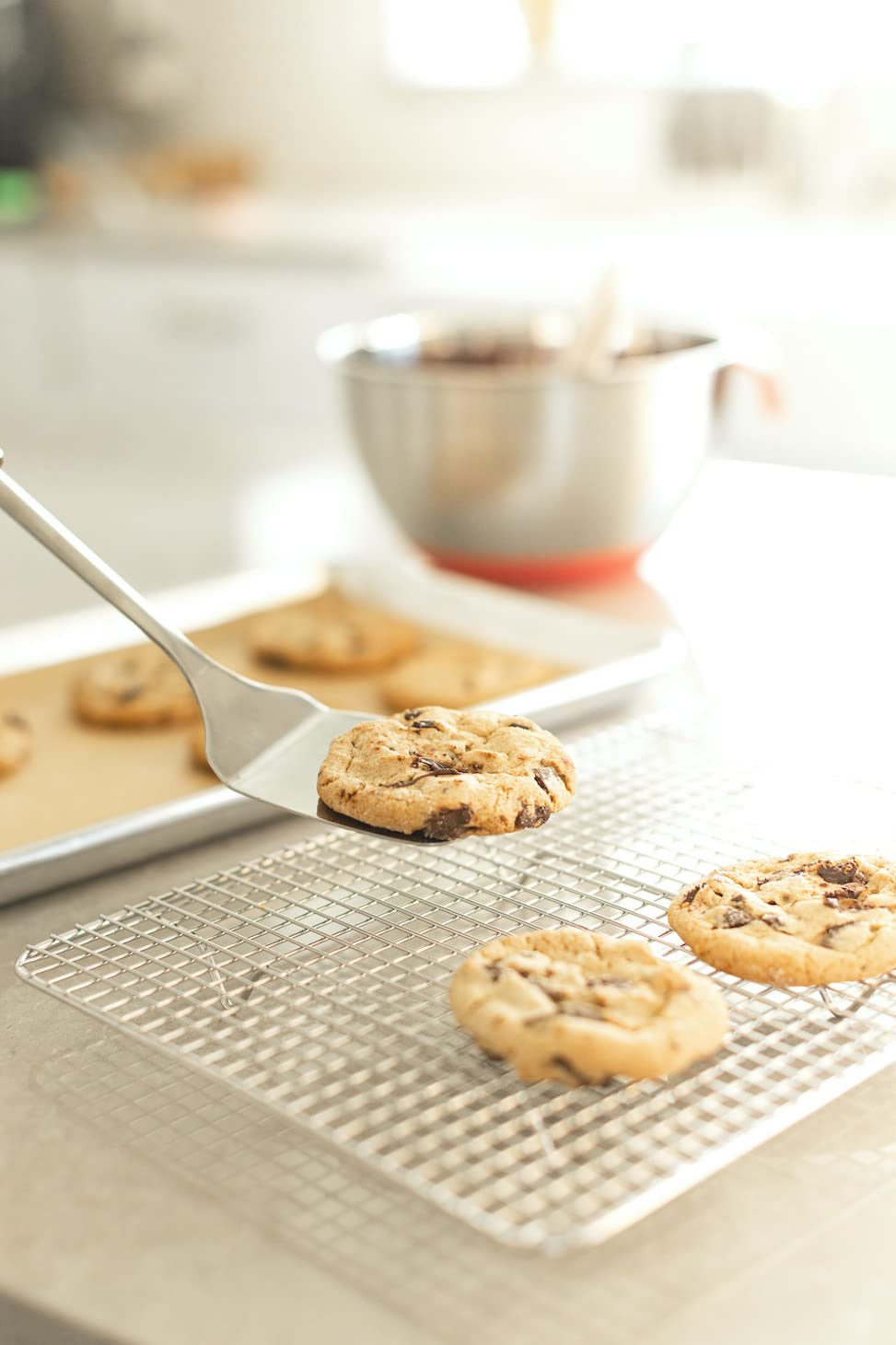 Kitchenatics fits 9x13 pans, a versatile baking companion.