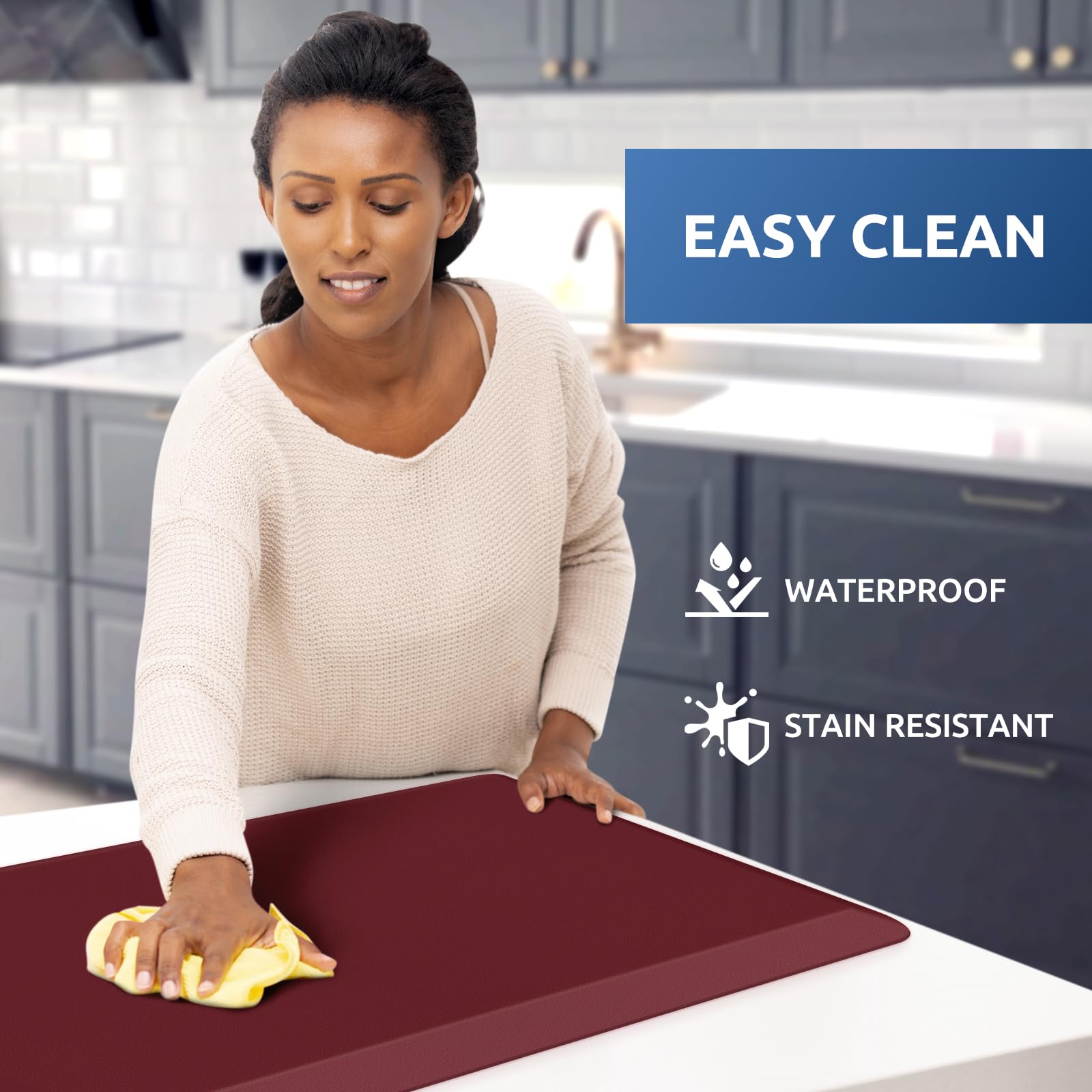KitchenClouds waterproof red mat is easy to wipe clean after spills.