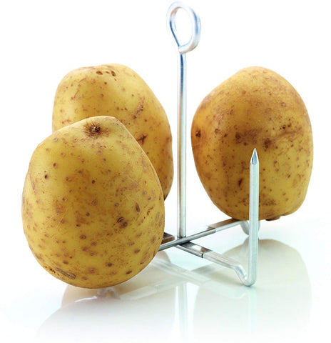 KitchenCraft 4-prong stand in use for upright potatoes in oven.