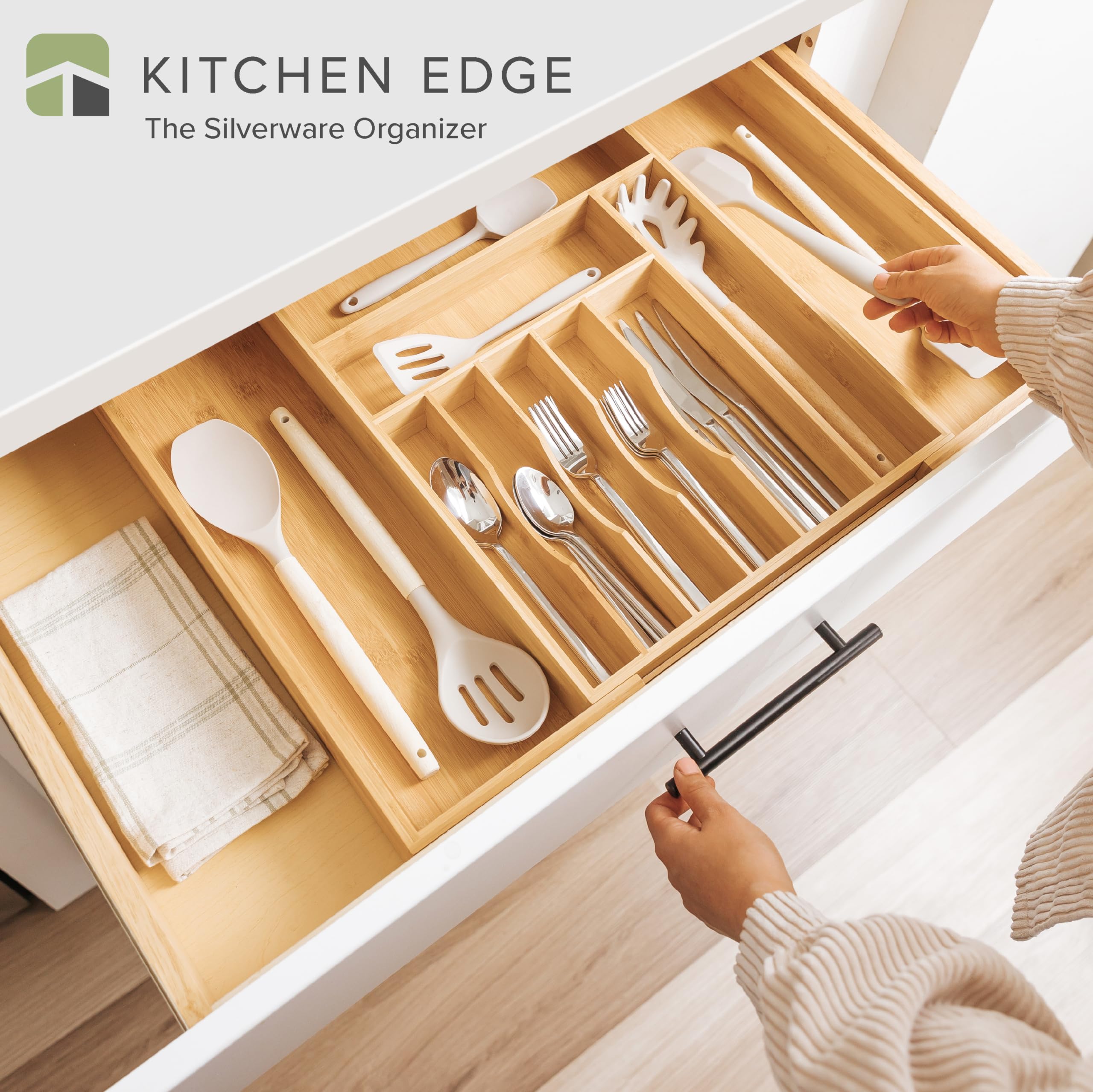 KitchenEdge bamboo flatware tray six-compartment design simplifies sorting.