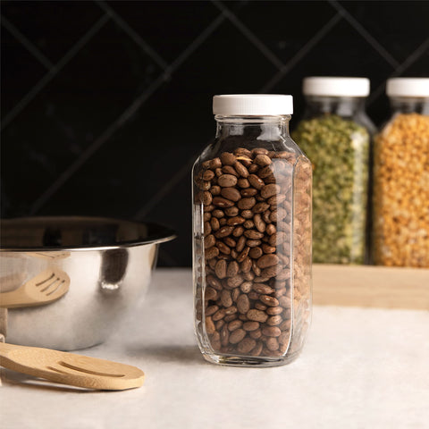 Kitchentoolz dishwasher-safe glass bottle for easy cleaning after use.