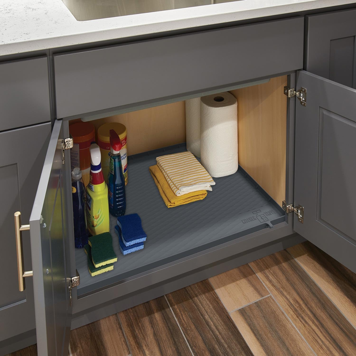 Kitchen Trove multi-purpose under-sink mat doubles as a pet food tray.