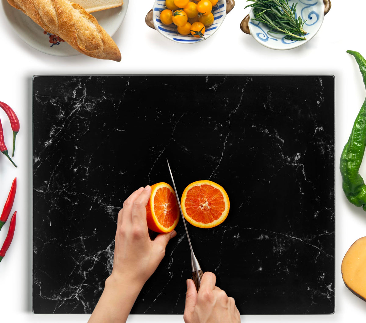 Kitchenville glass cutting board 20x16 with black marble design offers durable counter protection.