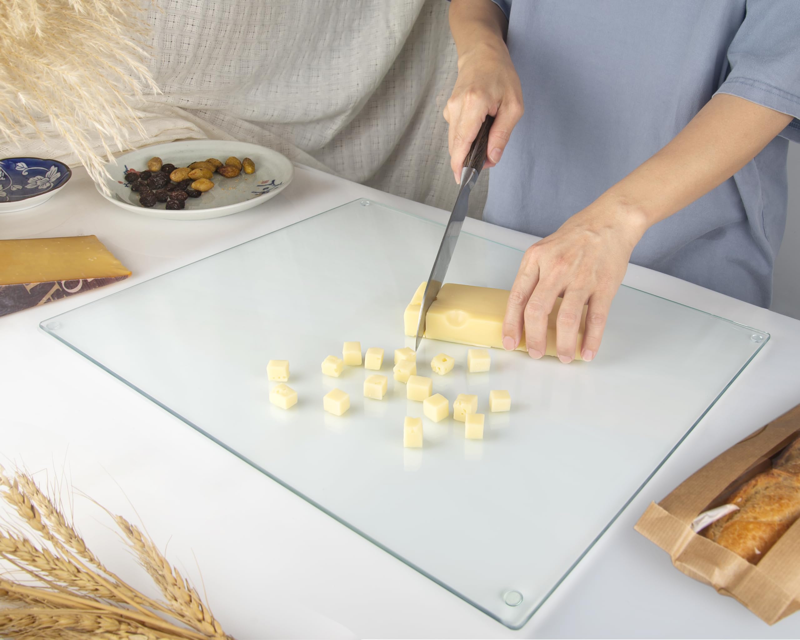 Kitchenville glass cutting board 16x12 is dishwasher-safe for quick cleanup.