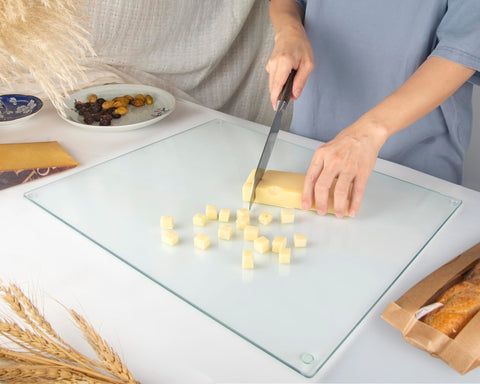 Kitchenville glass cutting board 16x12 is dishwasher-safe for quick cleanup.
