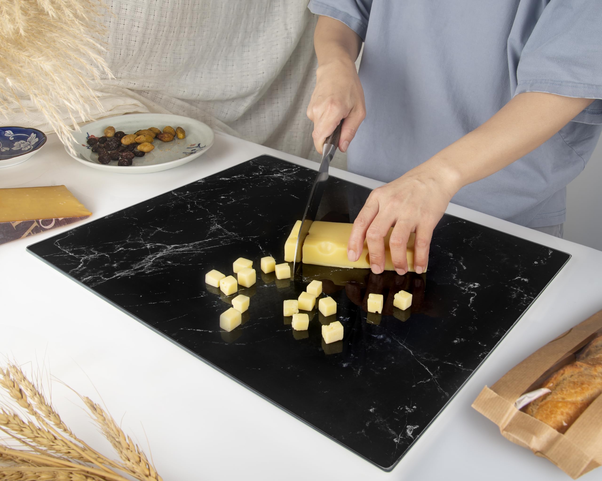 Kitchenville glass cutting board easy to clean with quick wipe.