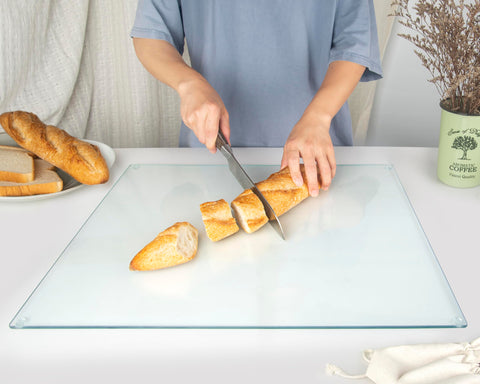 Kitchenville glass cutting board 16x12 features non-porous surface resisting stains and odors.