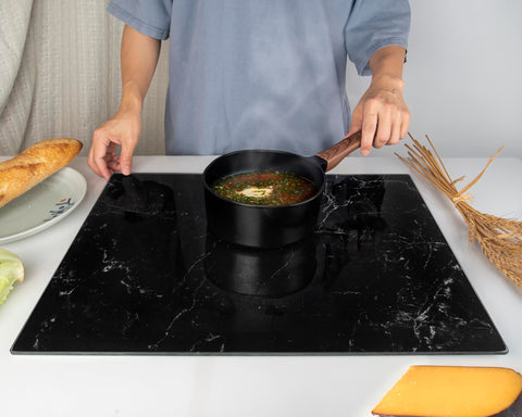Kitchenville glass cutting board versatile for slicing, serving, and display.