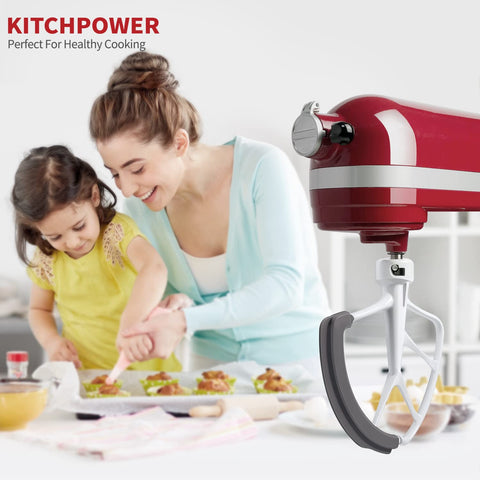 KITCHPOWER flex edge beater bottom-scrape demonstrates reaching the bowl bottom for uniform batter.