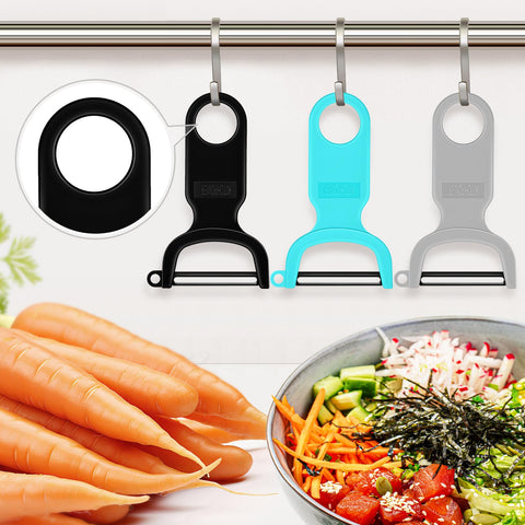 KITCHPOWER Original Vegetable Peeler in use peeling carrots and cucumbers smoothly.