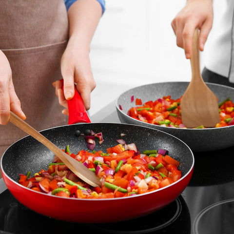 KITEISCAT Acacia wooden spoon in pot demonstrates non-stick friendly stirring
