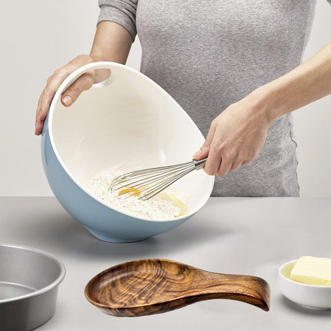Kityemo walnut spoon rest on counter, helps keep surfaces clean and ready.
