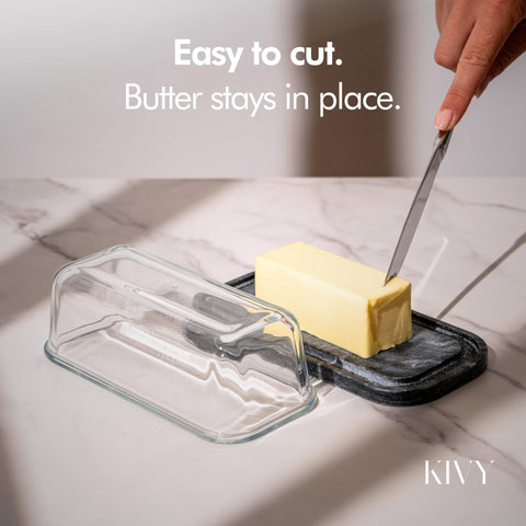 Butter dish on fridge door shelf for easy access.