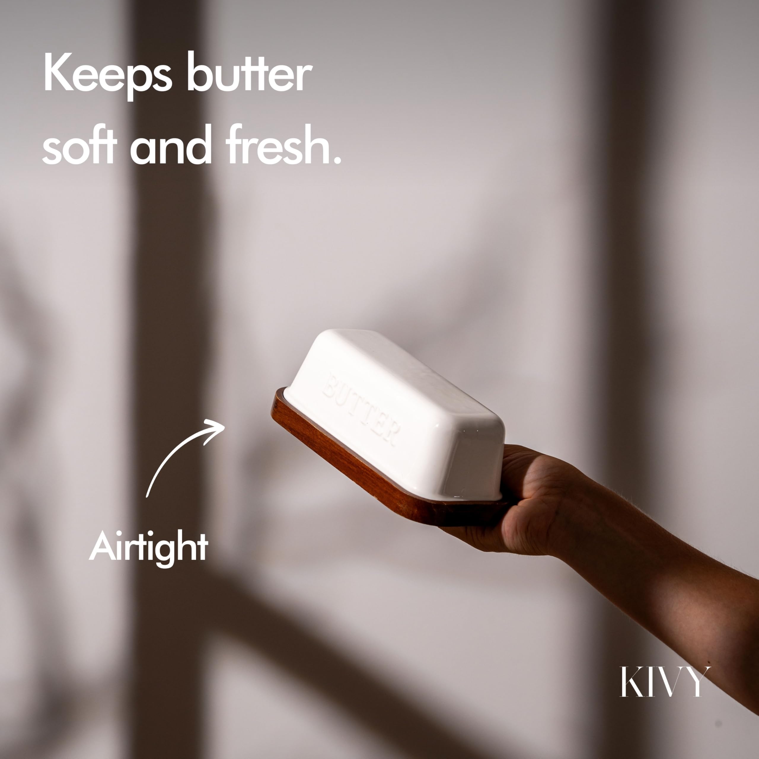 Close-up of KIVY ceramic butter dish on counter showing its durable glaze.
