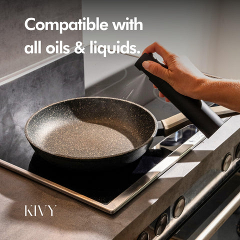 KIVY oil sprayer delivering a fine mist over vegetables.