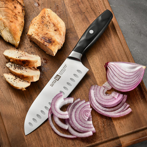 Klaus Meyer santoku knife balanced handle for precise chopping.