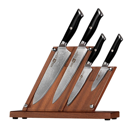Klaus Meyer Damascus knife block set with full-tang blades for stable cutting prep.