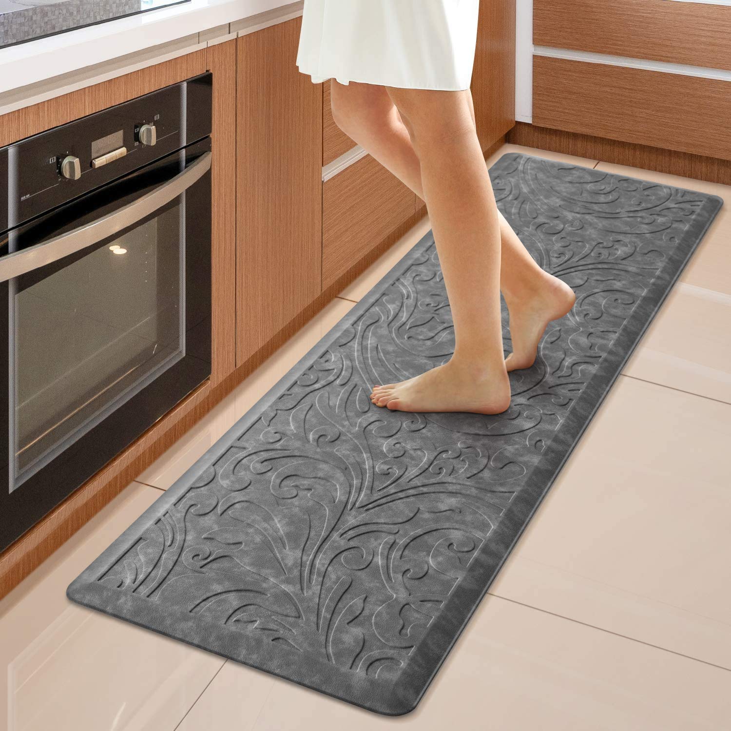 KMAT kitchen mat anti-fatigue cushion supports comfortable standing while cooking.