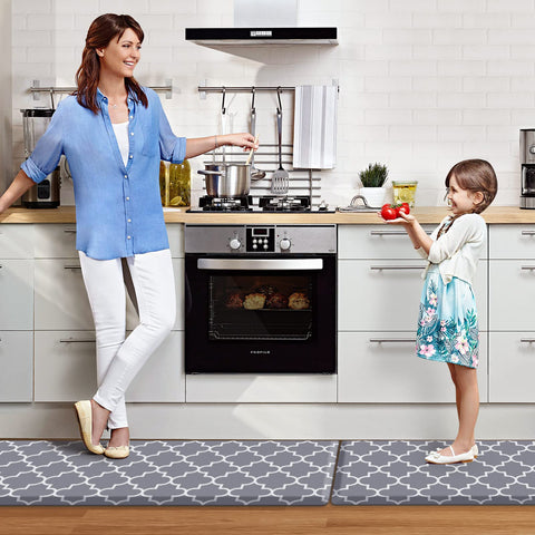 KMAT grey anti-fatigue mats stay in place with a non-slip bottom.