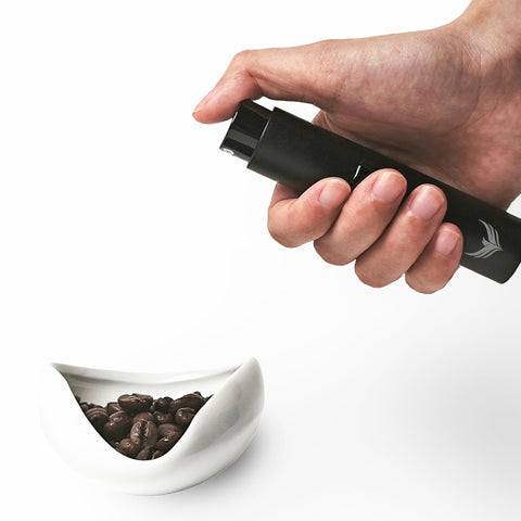 KNODOS coffee bean dosing cup for precise measurement during grinding