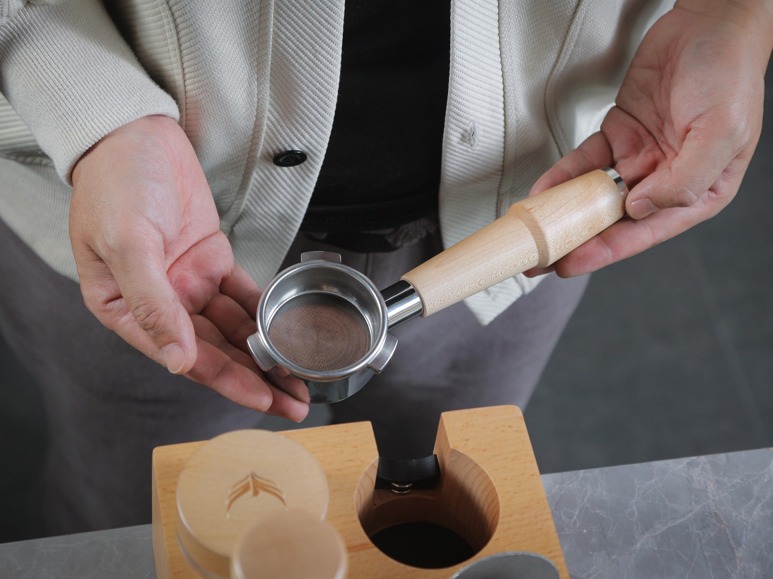 KNODOS maple handle portafilter provides durable grip and refined espresso station look.
