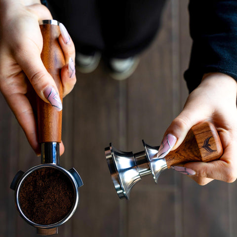 KNODOS rosewood tamper with 30lb spring for adjustable pressure.