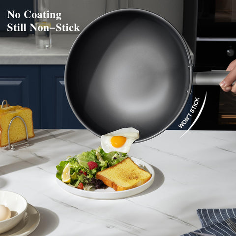 KOBACH deep-bodied titanium wok offering generous space for sauces