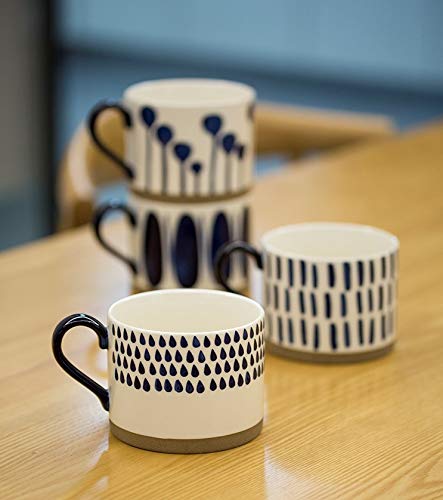 Koja hand-painted mug close-up reveals detailed artwork and premium porcelain for elevated tea moments.