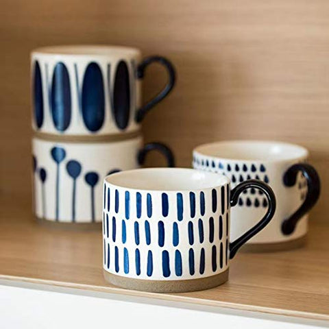 Koja porcelain glazed mug surface highlights a smooth, nonporous finish resisting stains and odors.
