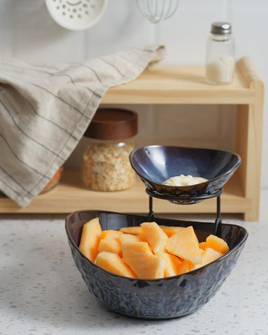 KOKUNKA metal stand detail adds modern contrast and sturdy support.