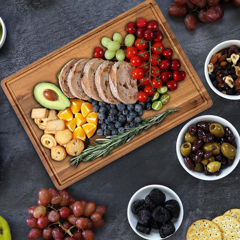KOLWOVEN acacia cutting board juice canal for meat prep and mess control.