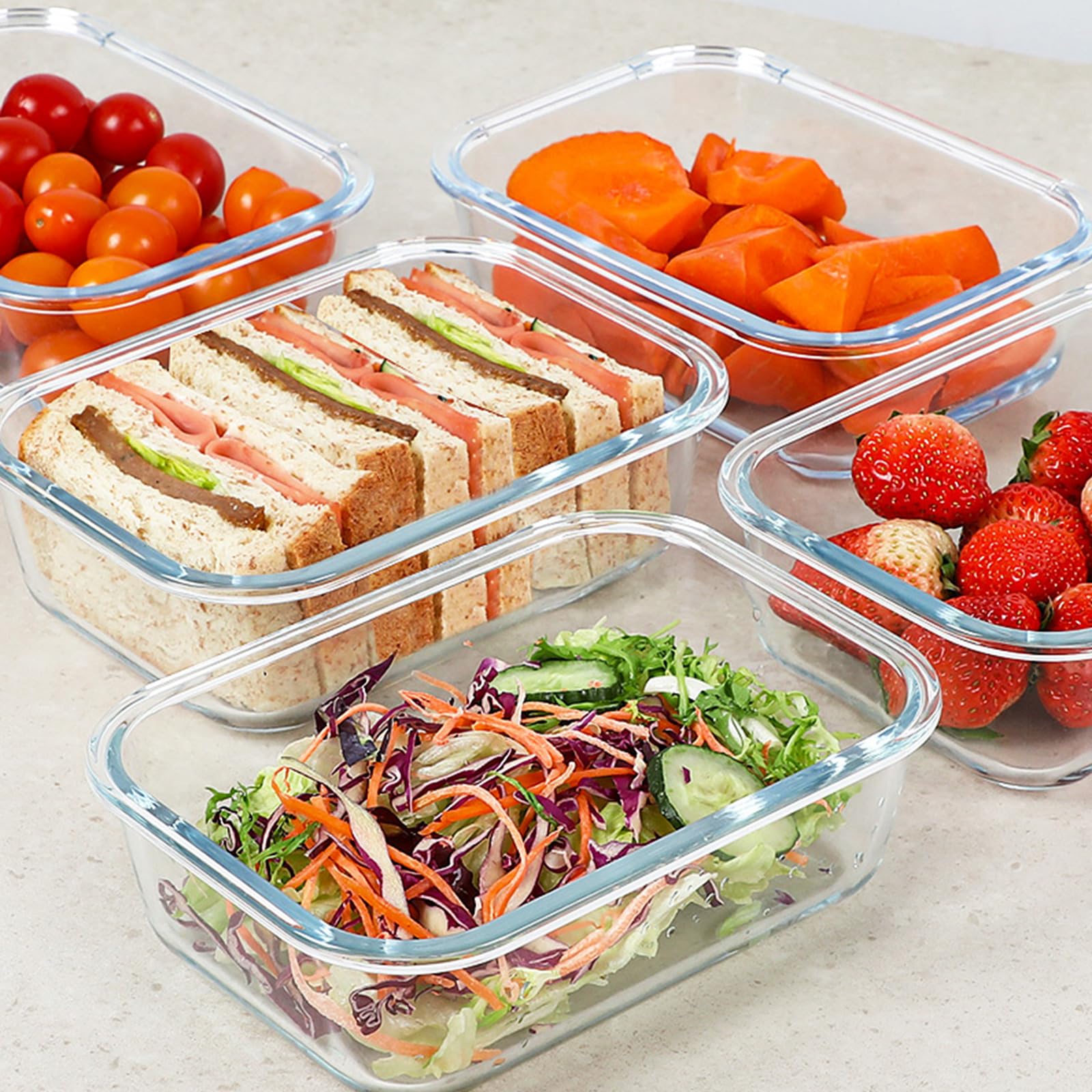 KOMUEE glass containers with airtight lids and silicone seal for leak-proof storage.