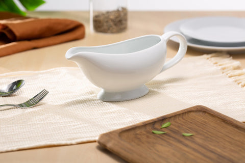 KooK snow white ceramic gravy boat adds an elegant touch to tables