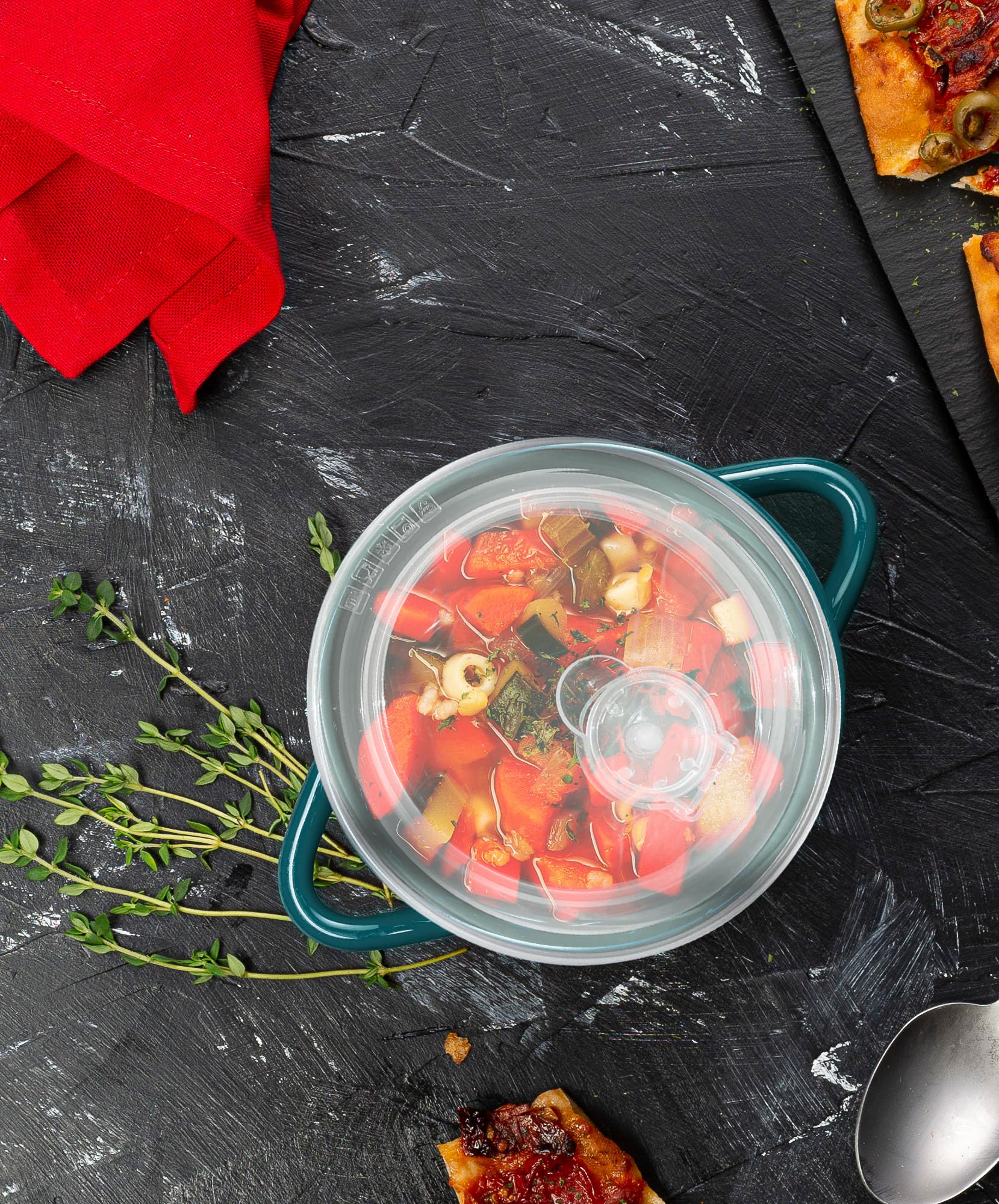 KooK ceramic soup crock with teal glaze and comfort-grip handles for secure serving.