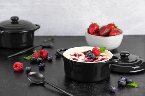 Kook cocotte on table ready for fruit crumbles and dessert
