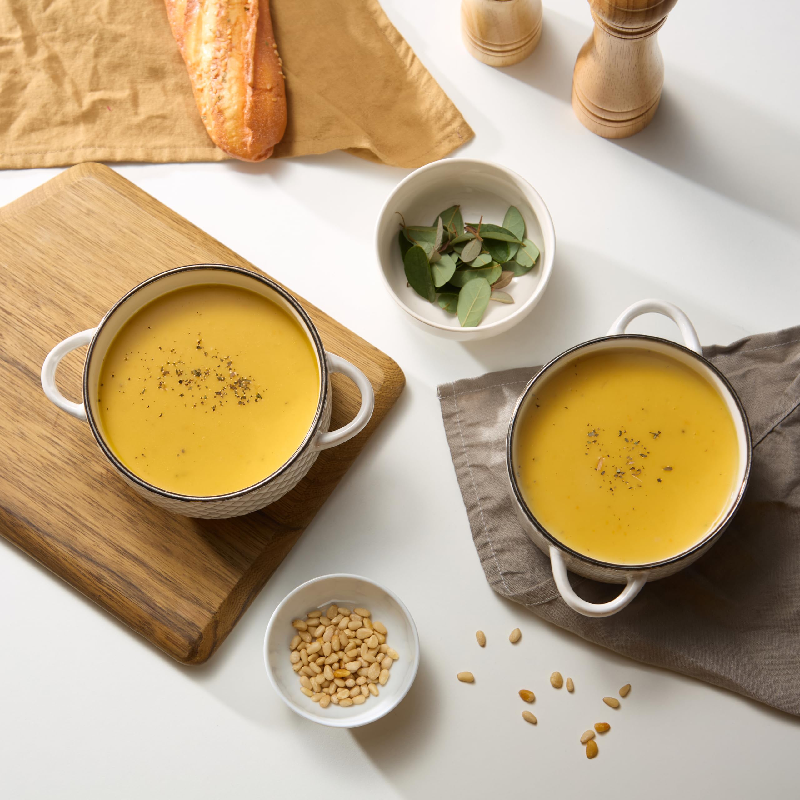 Ivory glazed Narbonne bowls with hand-painted rim and gloss finish