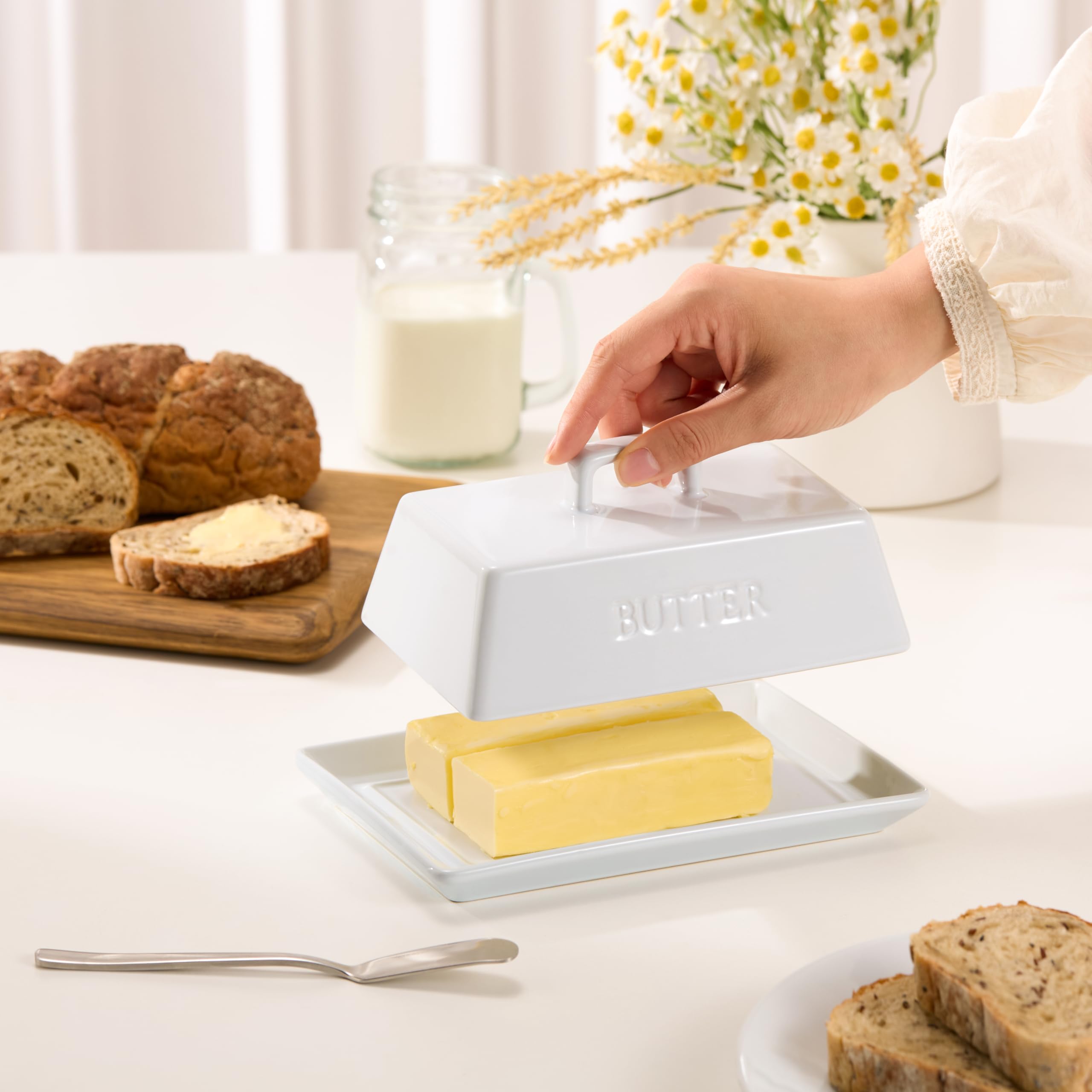 KooK butter dish top handle for easy lid lifting on the counter.