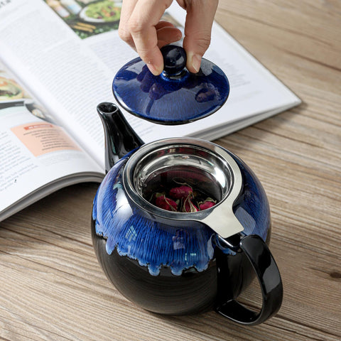 KOOV tea pot set up to serve six cups in a cozy kitchen.