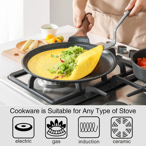 Kordisen dosa pan with spreader for evenly spread dosa batter.
