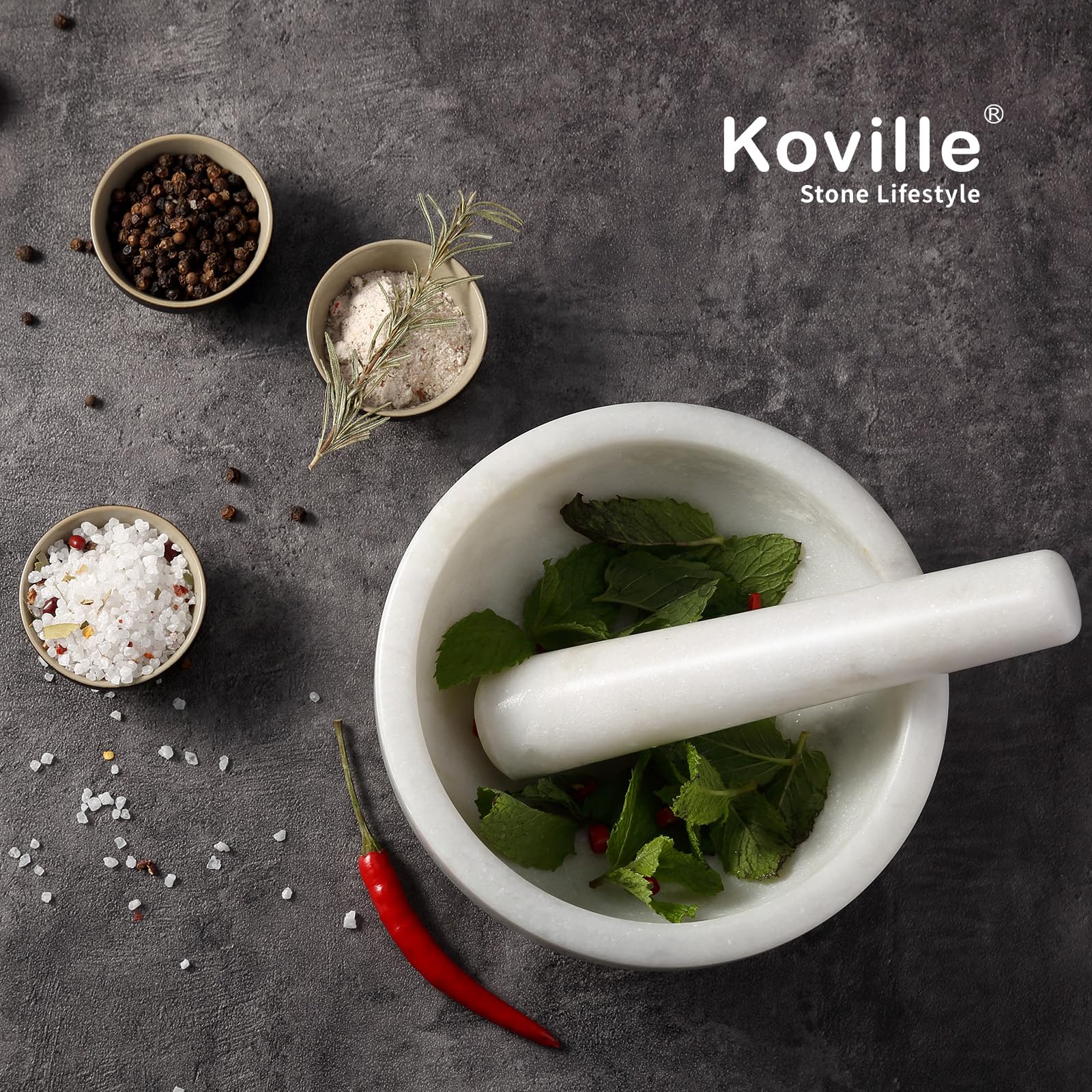 Koville hand carved from a single block marble shines on countertop