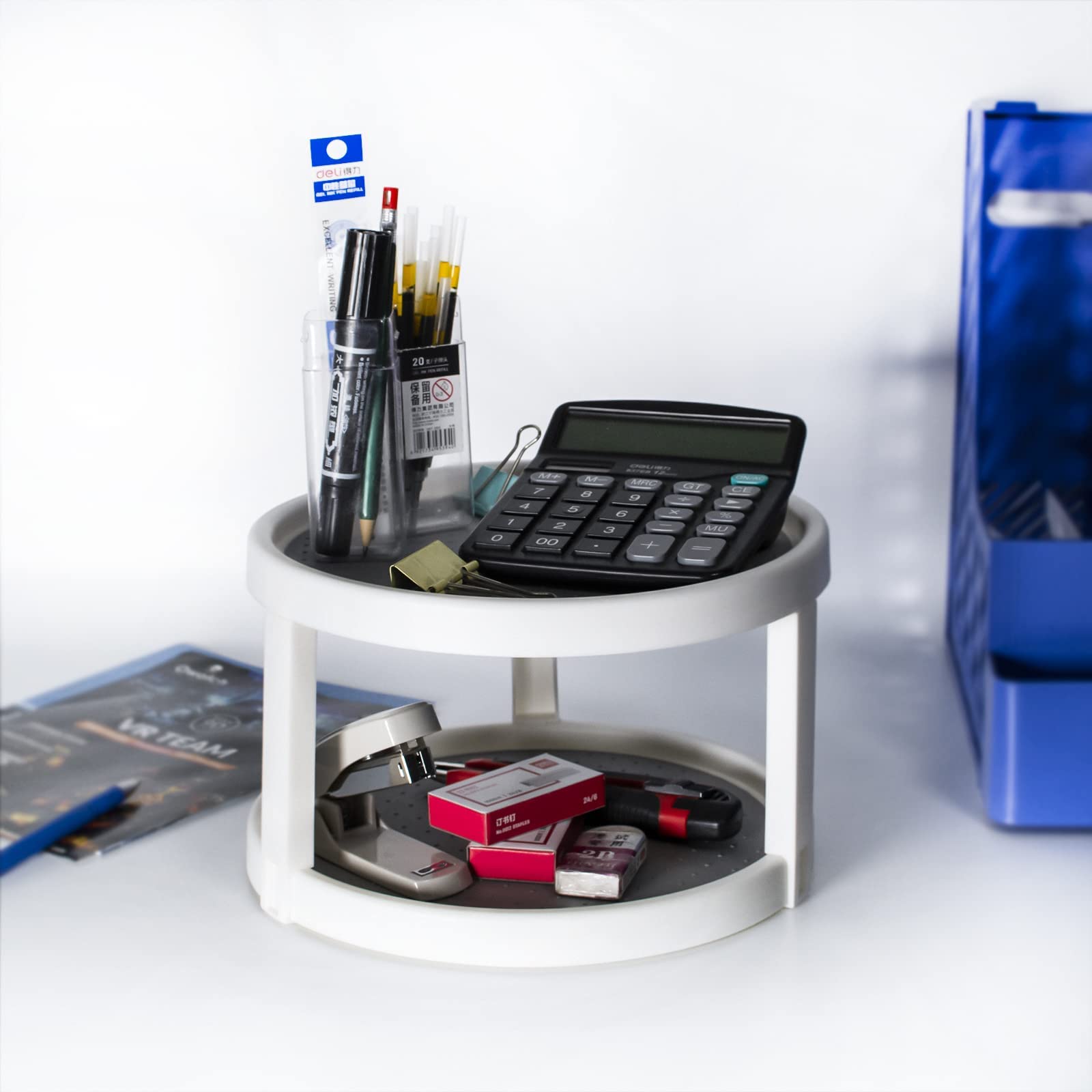 Kozloskyi rotating spice organizer maximizes cabinet storage space.