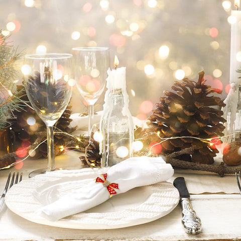 KPOSIYA Christmas crutch napkin ring adds sparkle to table decor.