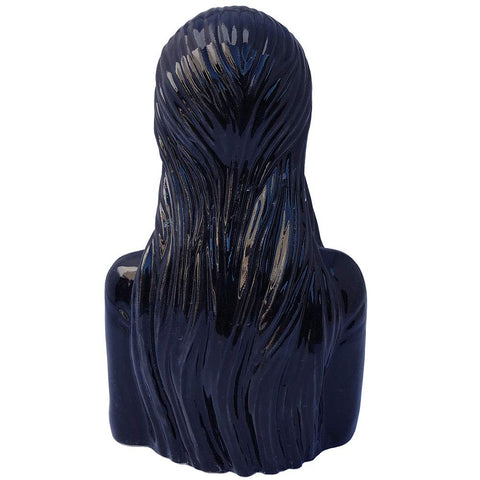Kreepsville 666 Elvira salt-pepper centerpiece elevates Halloween table décor.