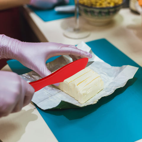 Kritkin spreader handheld use demonstrating comfortable grip in a kitchen