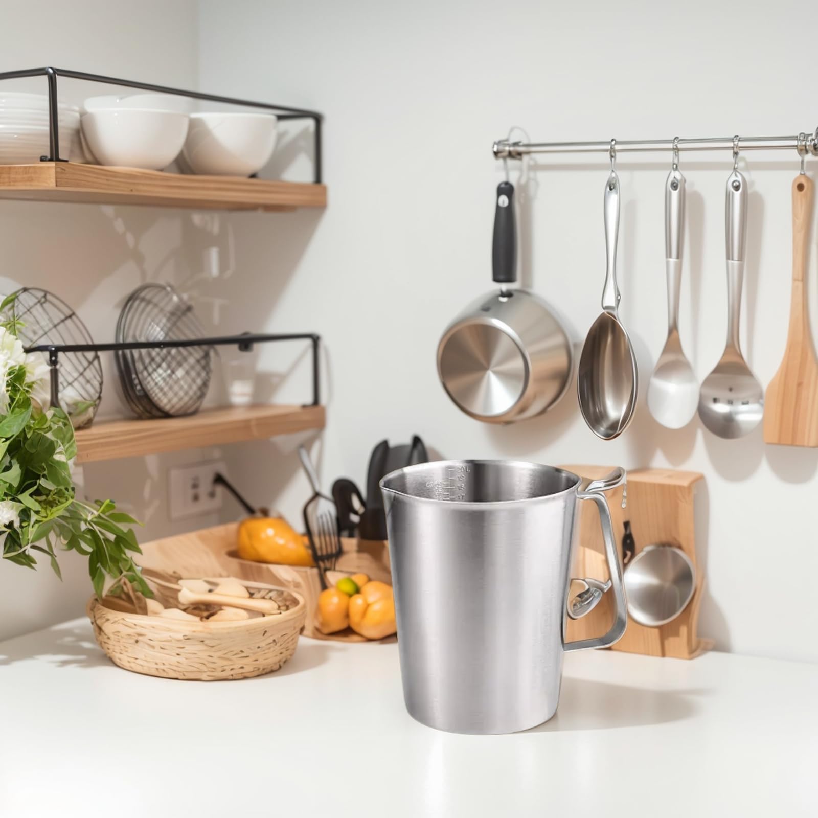 KSENDALO stainless cup with ergonomic handle for comfortable gripping and steady pouring.