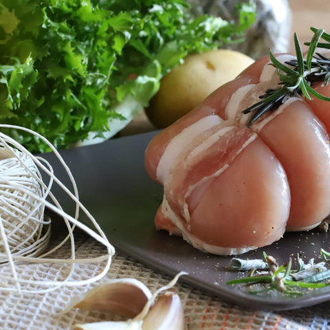 Küchenprofi rolled roast tied securely with natural cotton twine.